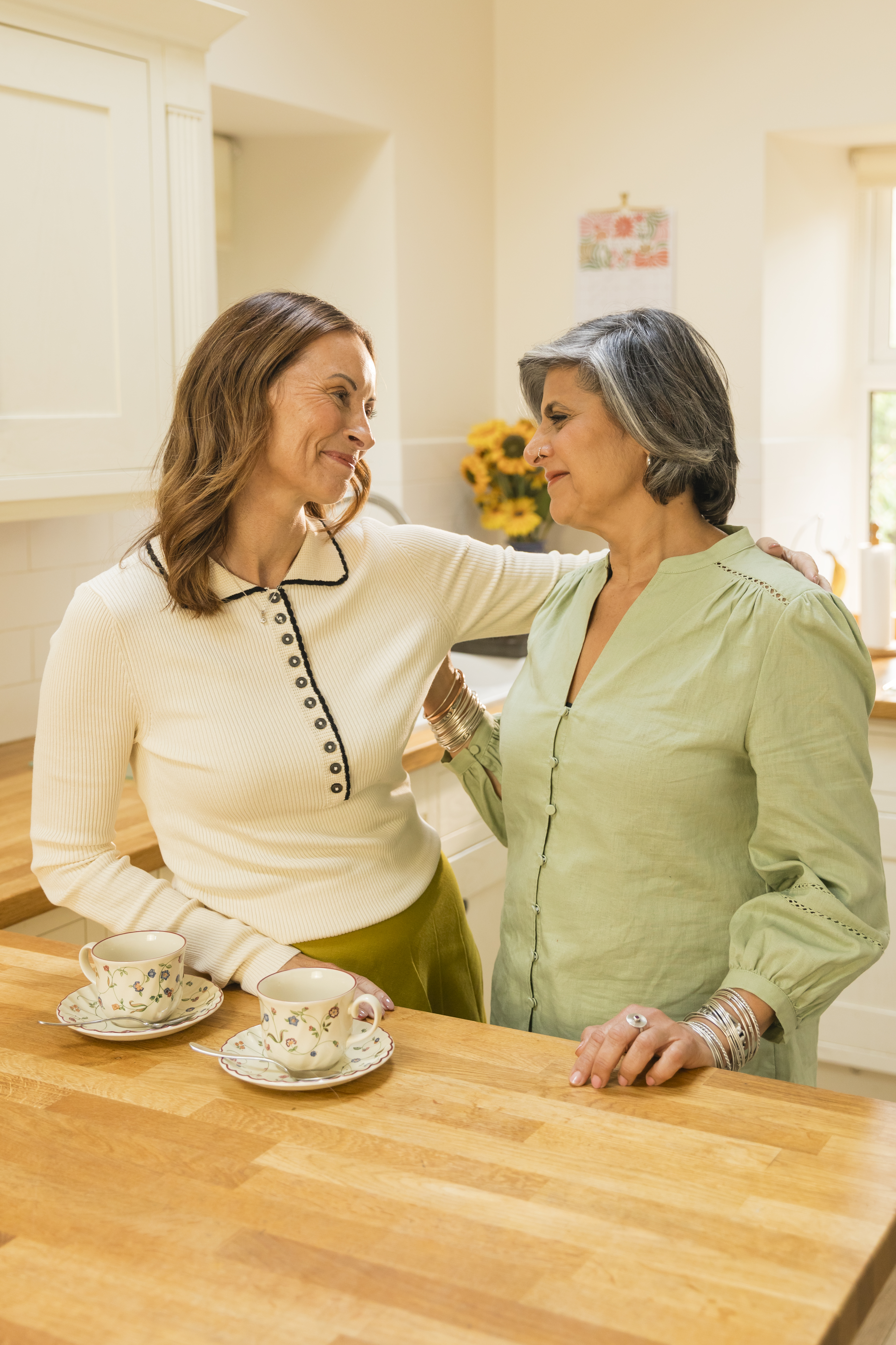 Image of two carents feeling supported in their journey of caring for an elderly parent