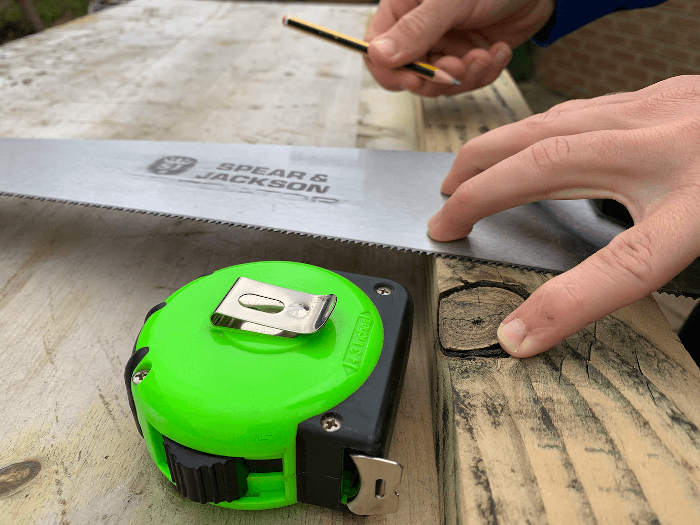 Saw and tape measure 