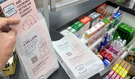Carents pharmacy bags on a pharmacy counter 