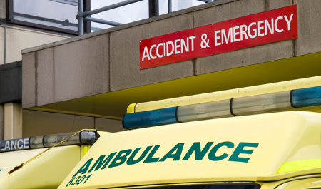 Image of an A&E with an ambulance sitting outside