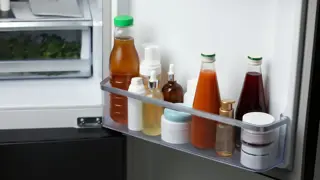 Bottles in a fridge door. Represents the 'Message in a Bottle' scheme by Lion’s Club International, where a bottle in a fridge has personal and medical information in a place where it can easily be found in case your elderly parent has an emergency.