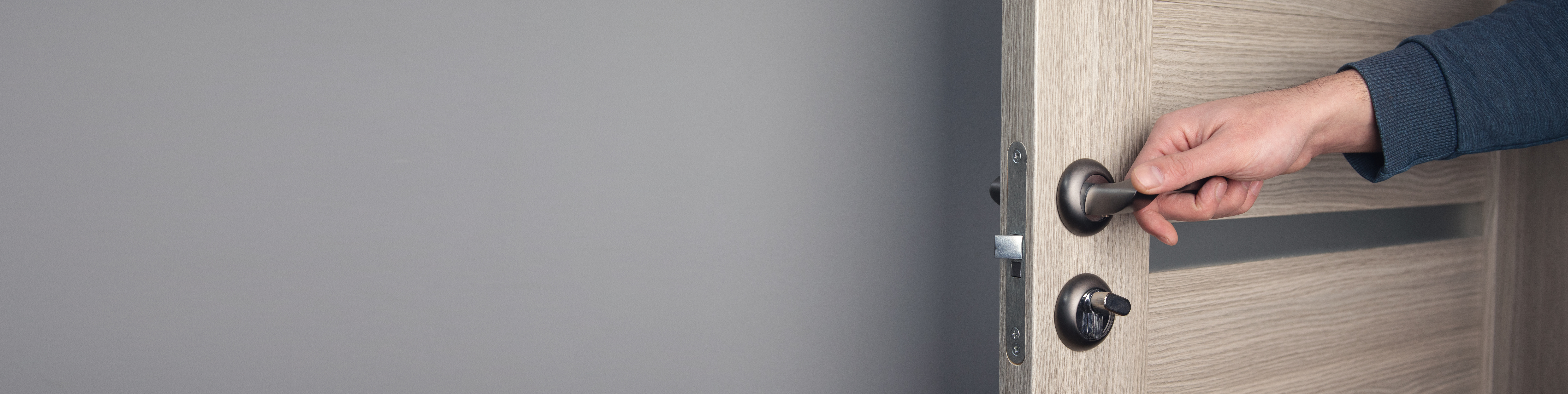 Elderly parent opening a door 