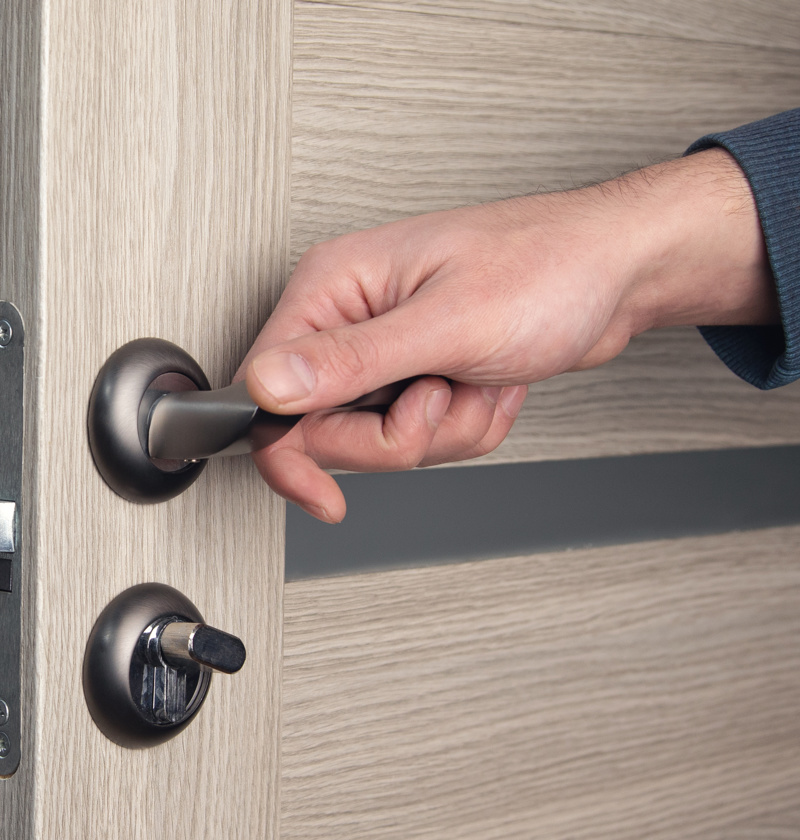 Elderly parent opening a door 
