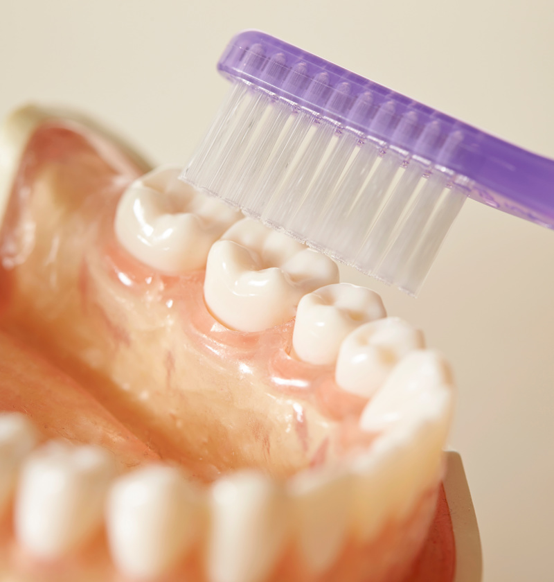 Choosing a denture brush for an elderly parent can be tricky 