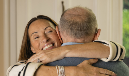 Image of a woman caring for her elderly parent - a carent